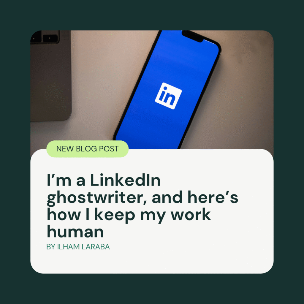 A smartphone displaying the LinkedIn logo lies on a desk next to a laptop, overlaid with a blog post title: I’m a LinkedIn ghostwriter, and here’s how I keep my work human